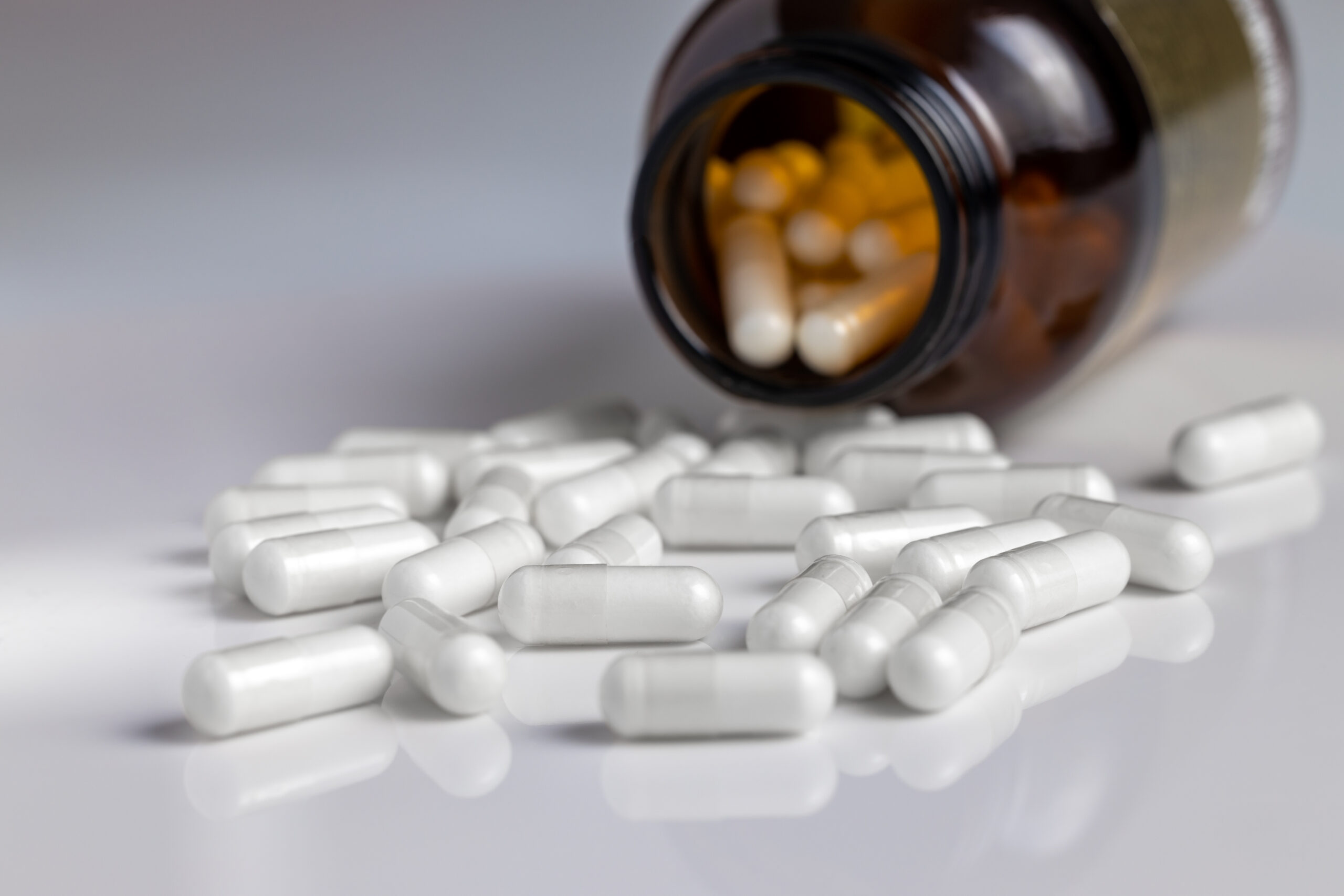 medication, capsule pills and pill bottle. medical concept