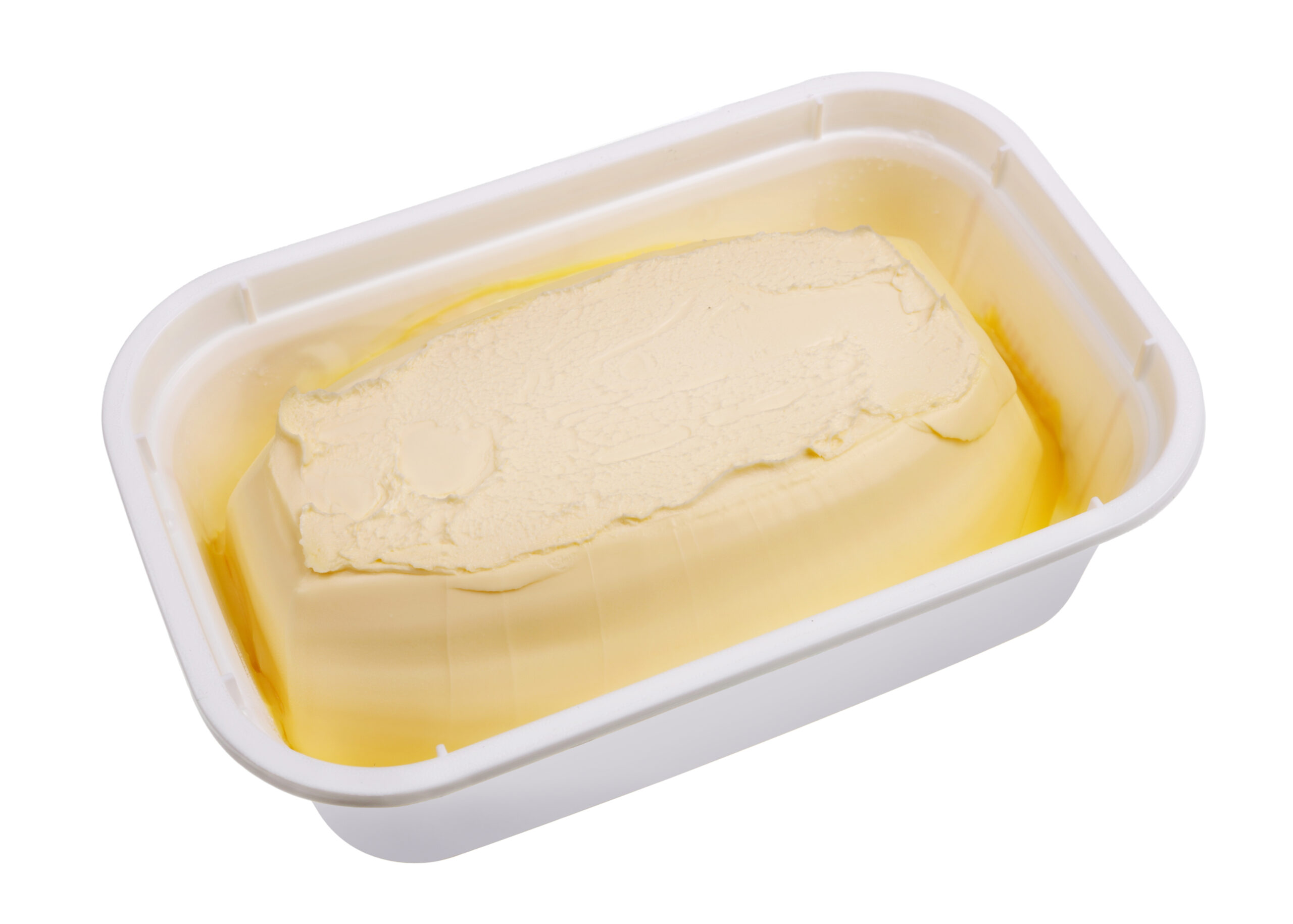 Creamy margarine in an industrial plastic container box. Isolated