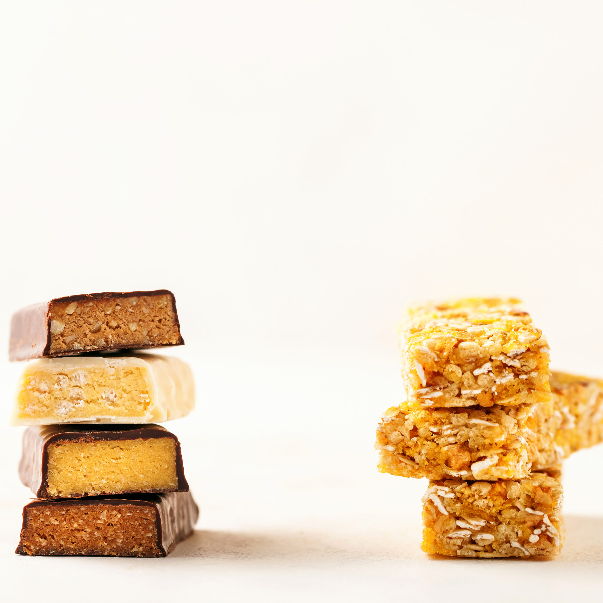 Different Energy protein bars and oatmeal bars on grey background. Set of energy, sport, breakfast and protein bars