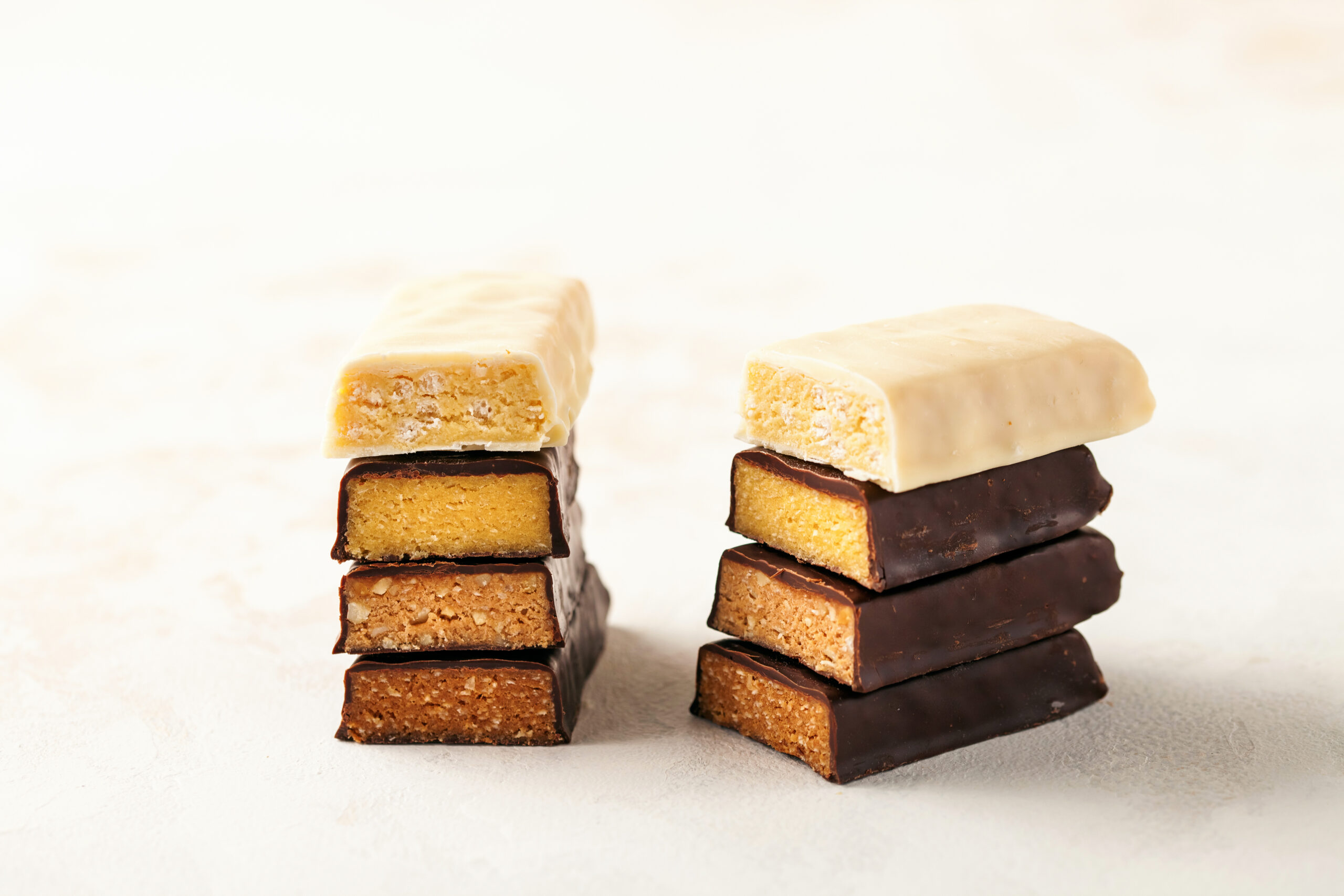 Different Energy protein bar on light background.